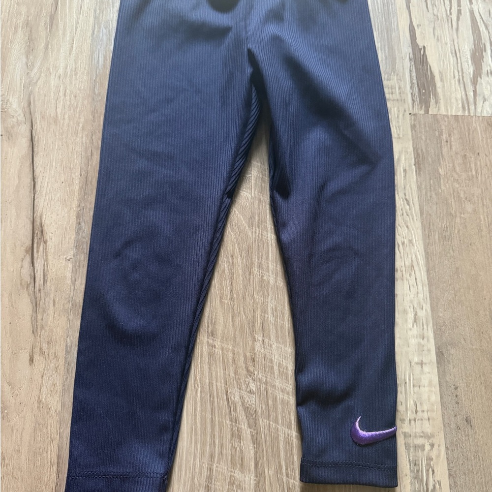 Nike Kids Navy Leggings with Purple Swoosh Accent
